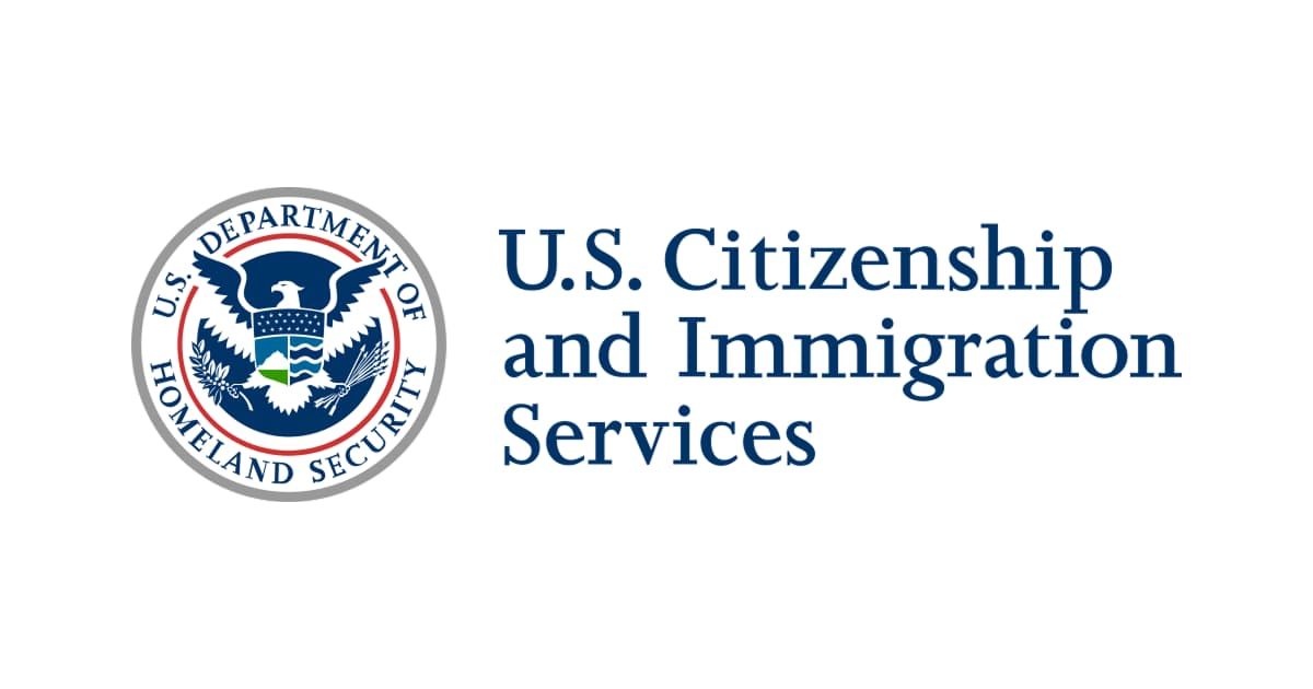U.S. Citizenship and Immigration Services seal and wordmark.